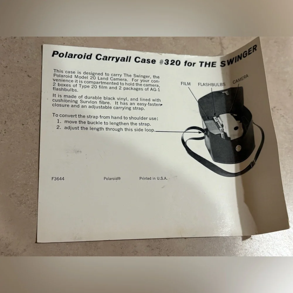 Vintage Polaroid Swinger camera and case